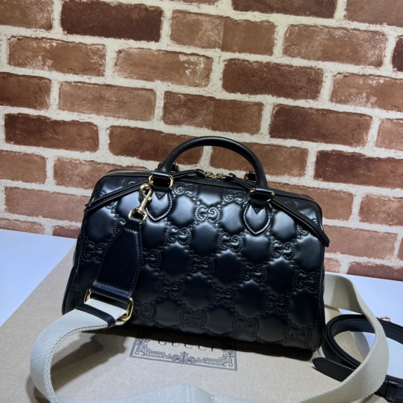 G*u*i top handle bags